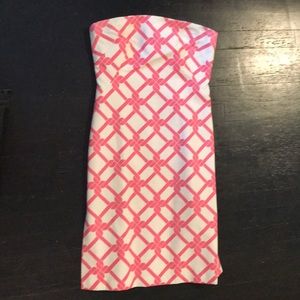 MILLY • Women’s pink and white strapless dress.